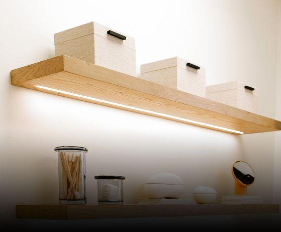 Lighted white oak floating shelves