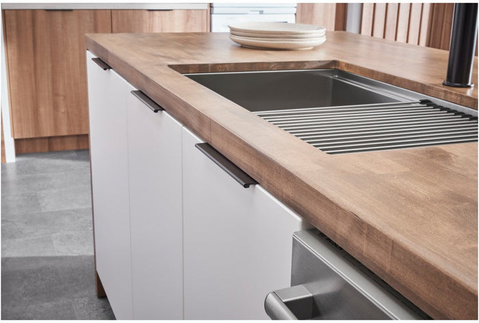 Edgefield Cabinet Tab Pull installed on cabinets