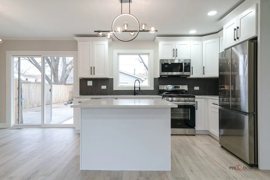 Elegant White Shaker Kitchen Remodel with Fishbone Backsplash in Palatine, IL