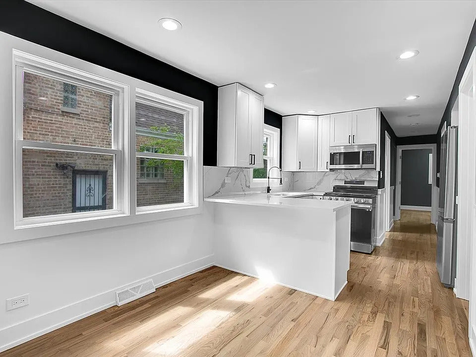 Elegant White Shaker Peninsula Kitchen Design in Mount Prospect, IL